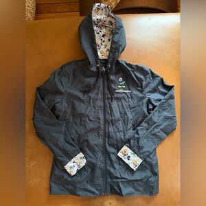 Disney Black Raincoat with Mickey Mouse design and lining